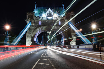 Light trails of passing cars on Tower bridge in London
