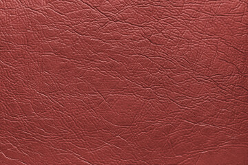 Genuine red leather texture, natural animal skin, luxury vintage cowhide background. Eco friendly leatherette, faux leather rough structure. Wallpaper, backdrop, copy space