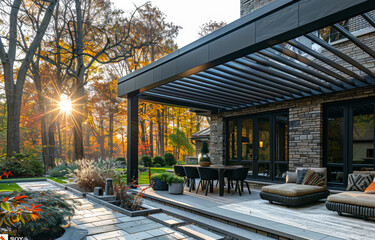 Modern house with patio and garden in the fall. Pergola provide shade and place to relax on patio