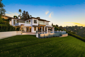 Luxurious modern villa with sunset backdrop