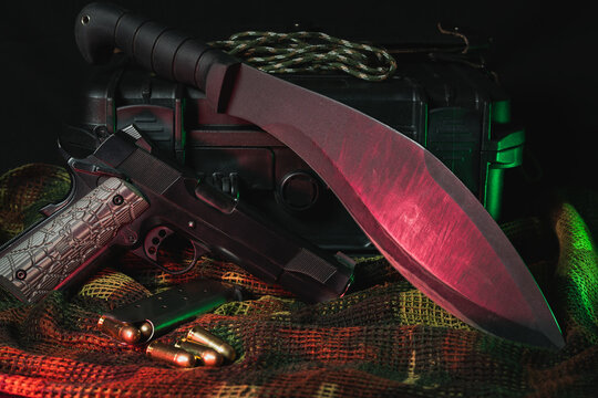 Weapon of the end of the world. Tactical kukri knife and American 45 caliber pistol.