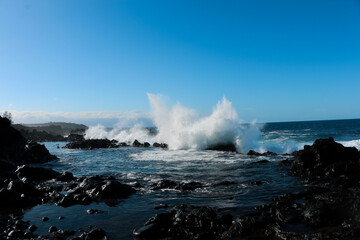 waves crashing on rocks