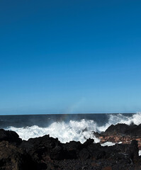 waves crashing on rocks
