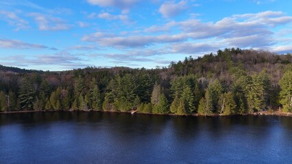 Typical Canadian landscape a beautiful Lake surrounded by pine trees aerial view - travel...