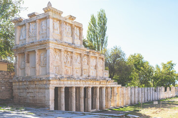 Sebasteion at Aphrodisias, marble reliefs, colonnade, trees, sunlight, shadow. Geyre, Aidin, Turkey...
