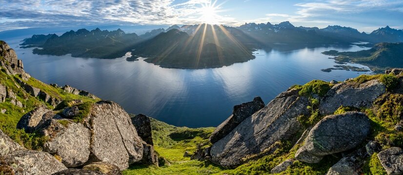 Panorama, view of Fjord Raftsund and mountains in the evening light, sun star, view from the summit of Dronningsvarden or Stortinden, Vesteralen, Norway, Europe