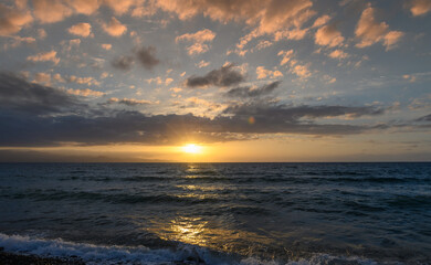 Sunset over the sea in Mediterranean sea.