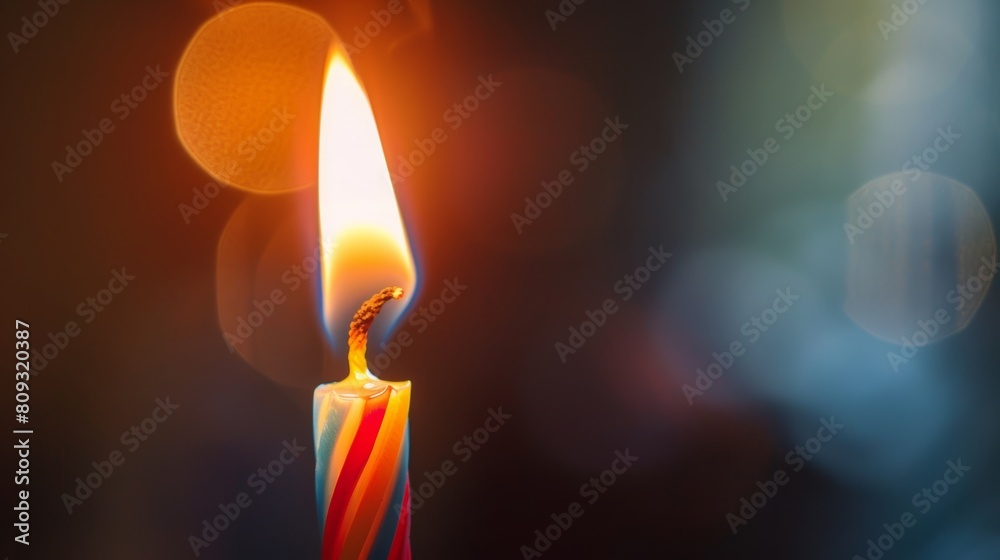 Poster Serene candle flame on dark background