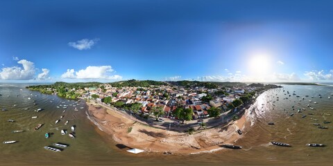 360 aerial photo taken with drone of Coroa Beach in Itacaré, Brazil, a former boating dock with...