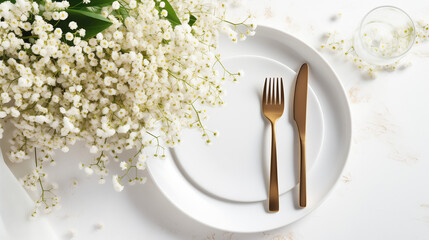 Table setting and beautiful gypsophila flowers on white background, top view. Holiday celebration
