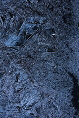 A blue background with ice and snow on it