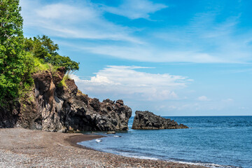 Rock and Blue Sea at Tulamben Beach Bali 