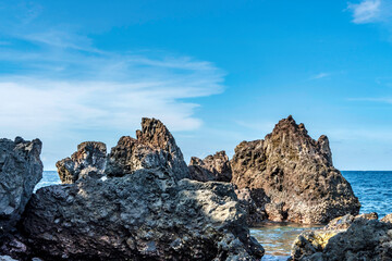 Rock and Blue Sea at Tulamben Beach Bali 