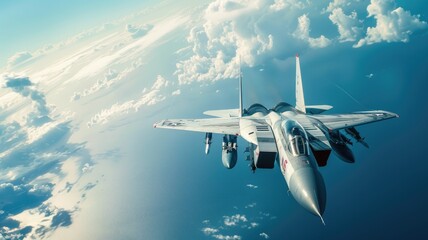 Fototapeta premium Fighter jet flying high above clouds with underwing missiles visible