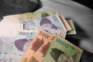 South Korea won bills on bed 