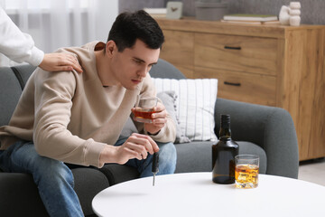 Woman stopping man from drunk driving, closeup. Don't drink and drive concept