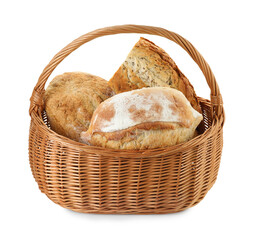 Wicker basket with different types of fresh bread isolated on white