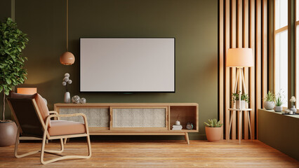 Mockup a TV wall mounted with leather armchair in pastel tone dark green color wall- 3D rendering