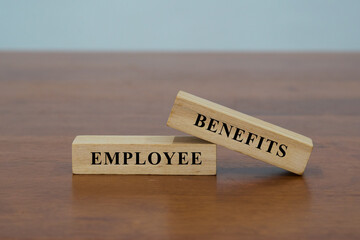 Employee Benefits on wooden blocks.
