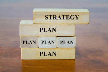 Strategy plan word on wooden blocks.