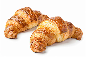 two croissants are sitting on a white surface