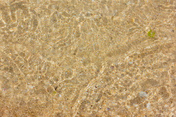 Ripple water of the sea on the sandy beach