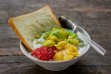 Es campur teler or called mix ice from Indonesia, made from alpukat (avocado), kelapa muda (young coconut meat), bread, pearl sagu, cassava tape, sticky rice tape, and milk. 