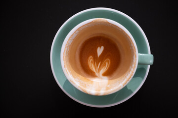 Empty Cup of latte art Coffee with heart Stain after finish