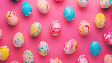 Vibrantly colored dyed Easter eggs on a pink background