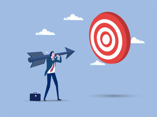 Business man worker holding an arrow precisely aiming at target bullseye achievement for win business strategy or setting goal and target concept