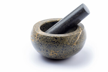 a mortar and pestle on a white surface