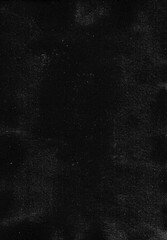 Shabby grunge texture of black old vintage surface with small dots