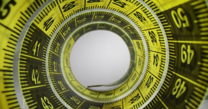 Flexible measuring tape twisted in roll to define length
