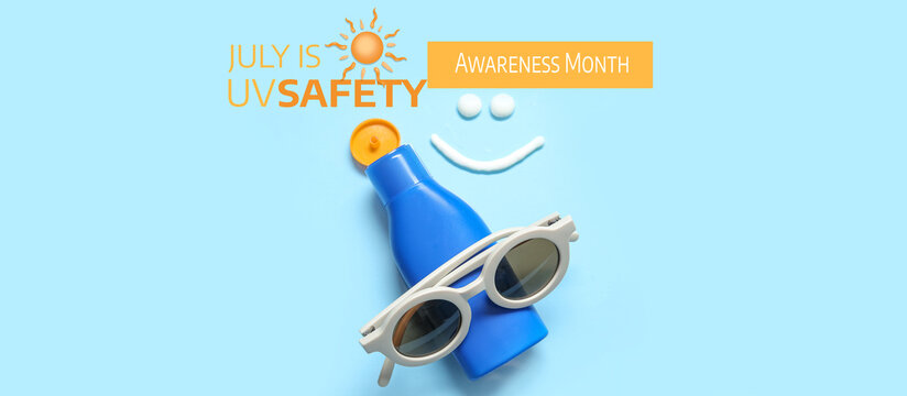 Drawings of smile made with sunscreen cream and sunglasses on blue background