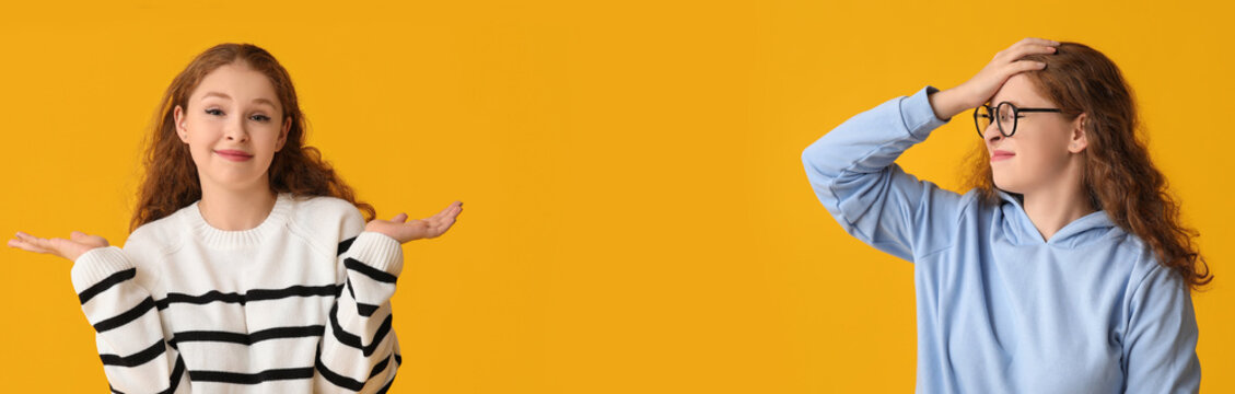 Portrait of worried young woman covering face with hand on yellow background