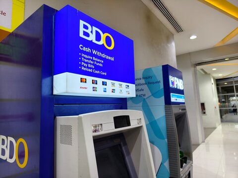 BDO and PNB ATM machines in a Manila mall offering various banking services