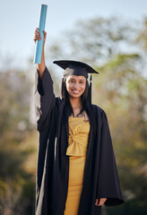 Graduation, celebration and portrait of woman with scroll on university campus for education...