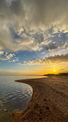 Obraz premium Beautiful sunset on the lake. Mountains and water. Kyrgyzstan, Lake Issyk-Kul