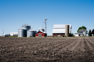 Rural Farm and Plowed Field