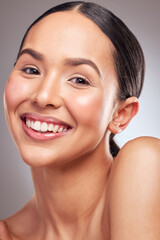 Obraz premium Beauty, portrait and smile with natural woman closeup in studio on gray background for wellness. Aesthetic, face and skincare with happy model at salon on spa for cosmetics or dermatology treatment