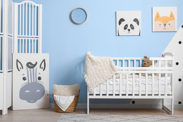 Stylish interior of children's room with baby crib
