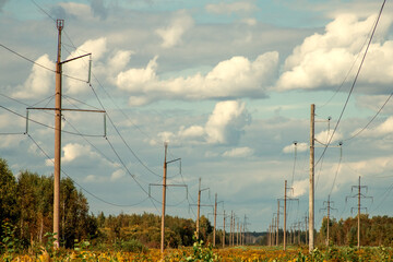 High voltage power lines. High voltage tower sky sunset background.