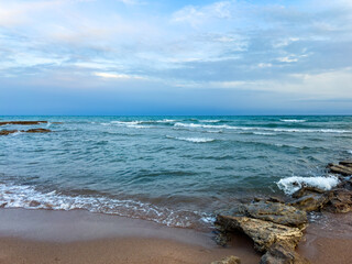 Sunny summer day on the lake. Mountains and sea. Kyrgyzstan, Lake Issyk-Kul