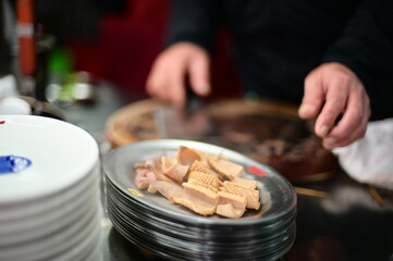 Delve into the culinary haven of Cisheng Temple Food Street in Taipei, where Squid Stand reigns supreme with its signature scalded squid dish, a local favorite that tantalizes taste buds.