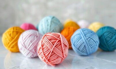 needlework - warm colored cotton yarn balls
