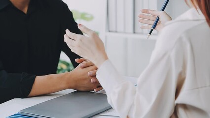 Asian business people having a meeting in a conference room