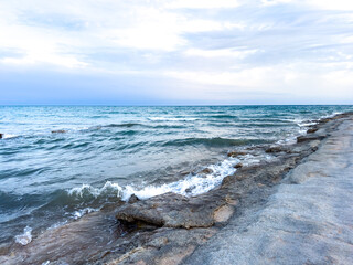 Sunny summer day on the lake. Mountains and sea. Kyrgyzstan, Lake Issyk-Kul