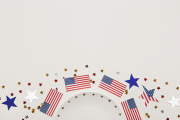 USA flags and stars on white background. American Independence Day celebration
