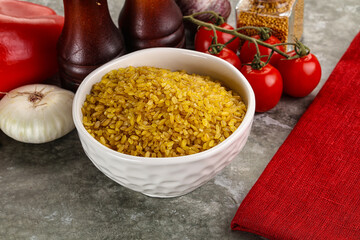 Dry wheat bulgur cereal heap