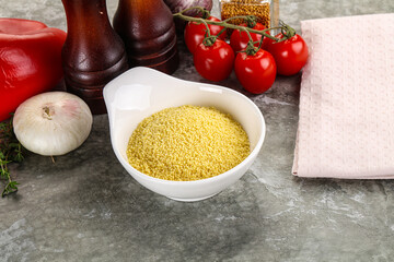 Raw dry wheat couscous grain